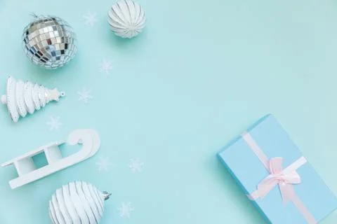 Simply minimal composition winter objects ornament sled fir tree ball gift box Stock Photos
