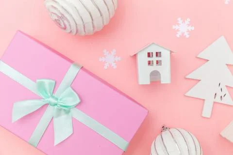 Simply minimal composition winter objects ornament sled fir tree ball gift bo Stock Photos