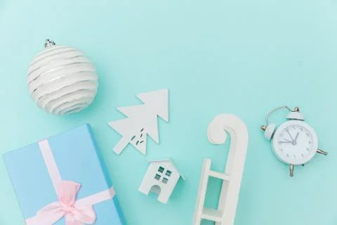 Simply minimal composition winter objects ornament sled fir tree ball gift bo Stock Photos