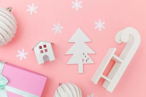 Simply minimal composition winter objects ornament sled fir tree ball gift bo Stock Photos