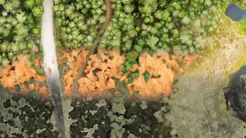 Simulated panning aerial view of wildfire in forest Stock Footage 128922954