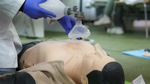 Simulated ventilation and compressions, Handson training in airway and CPR 스톡 동영상 324683531