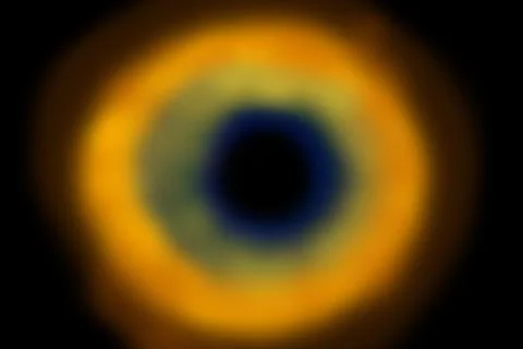 Simulation of a black hole in deep sidereal space with shades of Orange the a Stock Photos