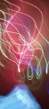 Simulation of galaxy light motion of stars in dark background, future energy 写真素材