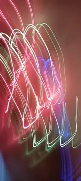 Simulation of galaxy light motion of stars in dark background, future energy Stock Photos