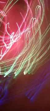 Simulation of galaxy light motion of stars in dark background, future energy 写真素材