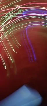 Simulation of galaxy light motion of stars in dark background, future energy 写真素材