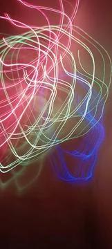 Simulation of galaxy light motion of stars in dark background, future energy Stockfoto's