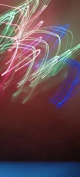 Simulation of galaxy light motion of stars in dark background, future energy Stockfoto's