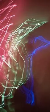 Simulation of galaxy light motion of stars in dark background, future energy Stockfoto's