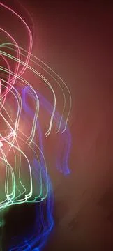 Simulation of galaxy light motion of stars in dark background, future energy Stock Photos