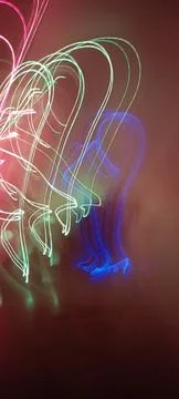 Simulation of galaxy light motion of stars in dark background, future energy Stockfoto's