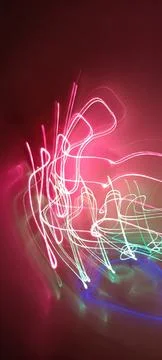 Simulation of galaxy light motion of stars in dark background, future energy Stockfoto's