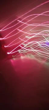 Simulation of galaxy light motion of stars in dark background, future energy 库存照片