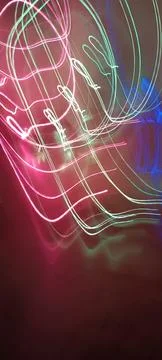 Simulation of galaxy light motion of stars in dark background, future energy Stockfoto's