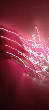 Simulation of galaxy light motion of stars in dark background, future energy Stockfoto's