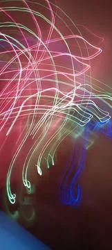 Simulation of galaxy light motion of stars in dark background, future energy Stockfoto's