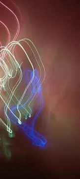 Simulation of galaxy light motion of stars in dark background, future energy Stockfoto's