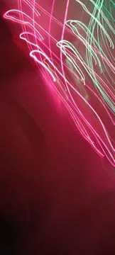 Simulation of galaxy light motion of stars in dark background, future energy 写真素材