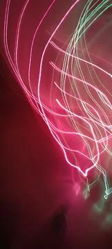 Simulation of galaxy light motion of stars in dark background, future energy Stockfoto's