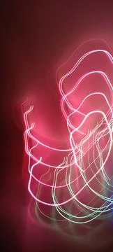 Simulation of galaxy light motion of stars in dark background, future energy Stockfoto's