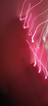 Simulation of galaxy light motion of stars in dark background, future energy Stockfoto's