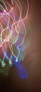 Simulation of galaxy light motion of stars in dark background, future energy Stockfoto's