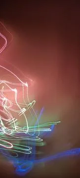 Simulation of galaxy light motion of stars in dark background, future energy 库存照片