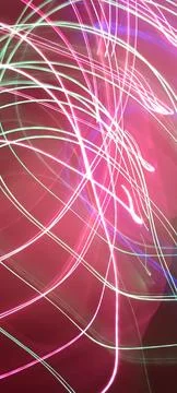 Simulation of galaxy light motion of stars in dark background, future energy 写真素材