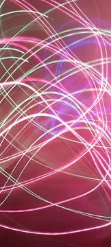Simulation of galaxy light motion of stars in dark background, future energy Stockfoto's