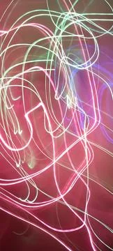 Simulation of galaxy light motion of stars in dark background, future energy Stockfoto's