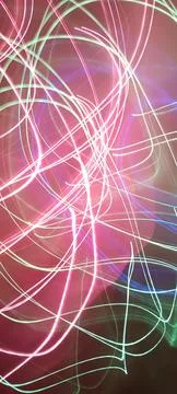 Simulation of galaxy light motion of stars in dark background, future energy Stockfoto's