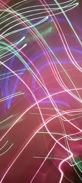 Simulation of galaxy light motion of stars in dark background, future energy Stockfoto's