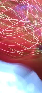Simulation of galaxy light motion of stars in dark background, future energy 写真素材