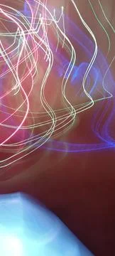Simulation of galaxy light motion of stars in dark background, future energy Stockfoto's
