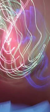 Simulation of galaxy light motion of stars in dark background, future energy Stockfoto's