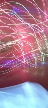 Simulation of galaxy light motion of stars in dark background, future energy 写真素材
