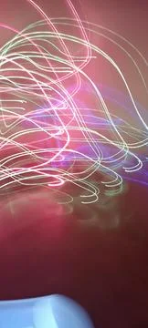 Simulation of galaxy light motion of stars in dark background, future energy Stockfoto's