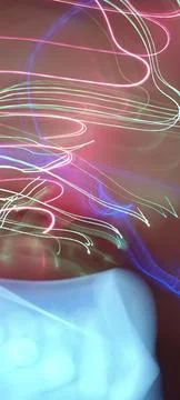 Simulation of galaxy light motion of stars in dark background, future energy Stockfoto's