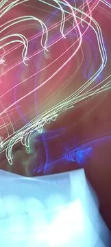 Simulation of galaxy light motion of stars in dark background, future energy Stockfoto's