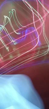 Simulation of galaxy light motion of stars in dark background, future energy Stockfoto's