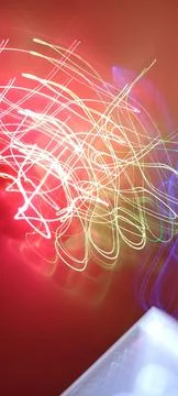 Simulation of galaxy light motion of stars in dark background, future energy 写真素材
