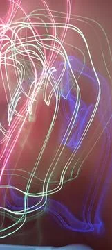 Simulation of galaxy light motion of stars in dark background, future energy Stockfoto's