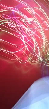 Simulation of galaxy light motion of stars in dark background, future energy Stockfoto's