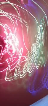 Simulation of galaxy light motion of stars in dark background, future energy Stockfoto's