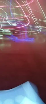 Simulation of galaxy light motion of stars in dark background, future energy Stockfoto's
