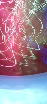 Simulation of galaxy light motion of stars in dark background, future energy Stockfoto's