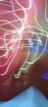 Simulation of galaxy light motion of stars in dark background, future energy Stockfoto's