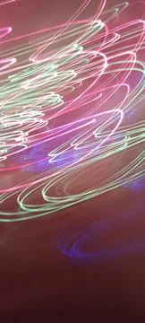 Simulation of galaxy light motion of stars in dark background, future energy 写真素材
