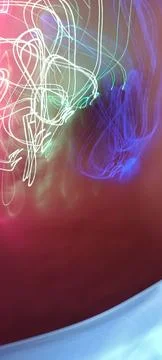 Simulation of galaxy light motion of stars in dark background, future energy 库存照片